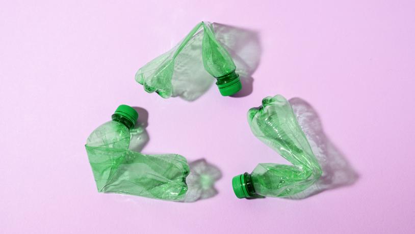 Top view green plastic bottles arrangement